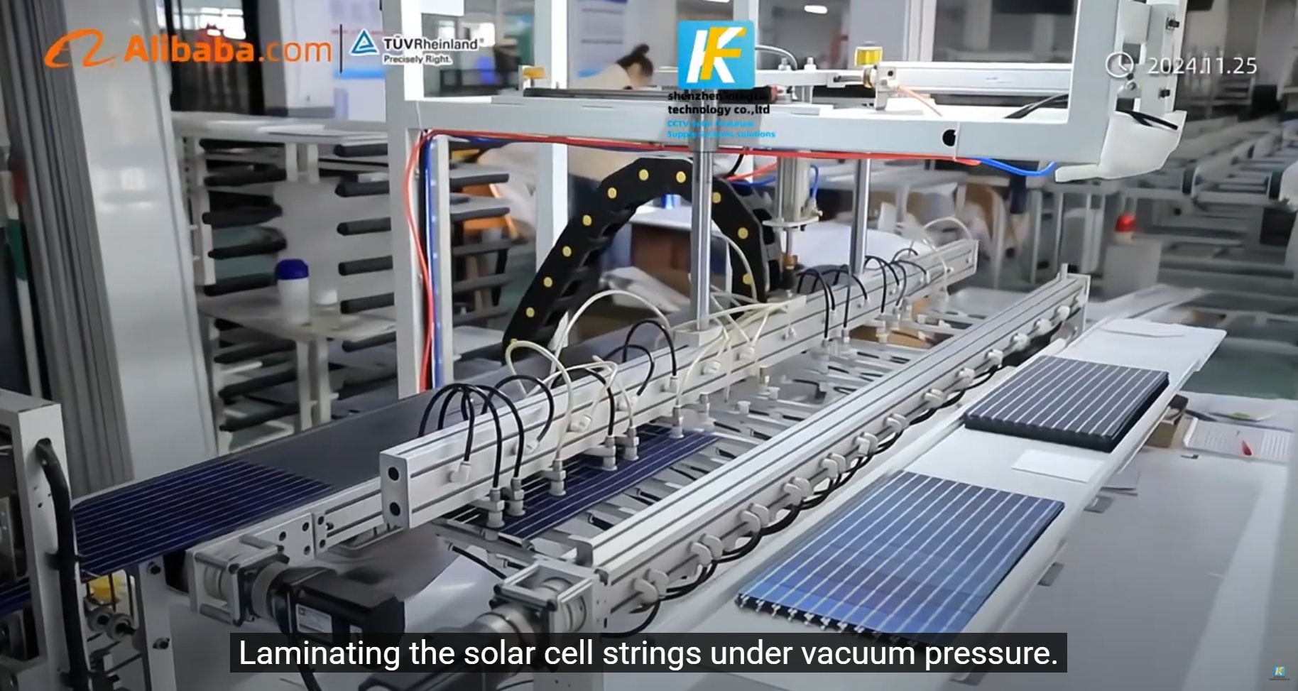 This image shows the lamination of solar cell strings under vacuum pressure, ensuring durability and reliability of solar-powered CCTV systems produced by a China solar kit manufacturer for smart city and rural electrification projects