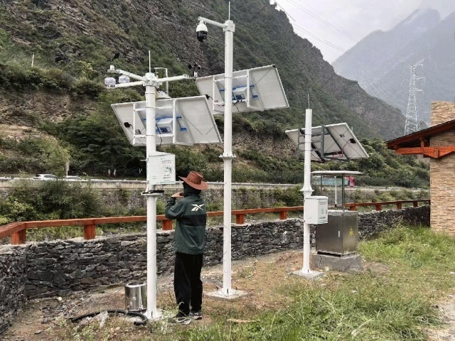 Solar-powered smart agriculture monitoring system operating in Aba Prefecture, Sichuan, China, providing continuous power for soil moisture, pest detection, and crop growth monitoring across remote farmland
