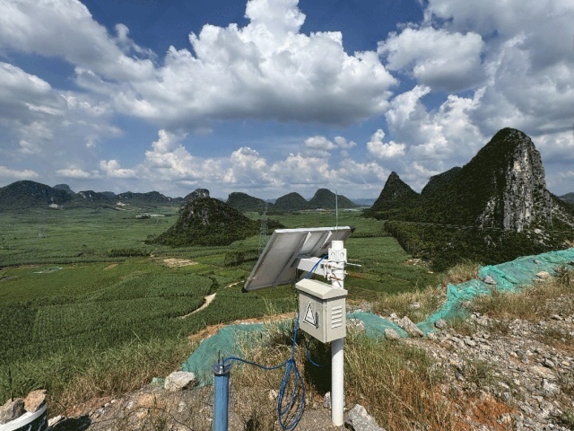 Solar CCTV system operating off-grid for slope monitoring in Guangxi’s mountainous terrain, powered by solar power kits from Shenzhen Kongfar Technology with LiFePO₄ battery support