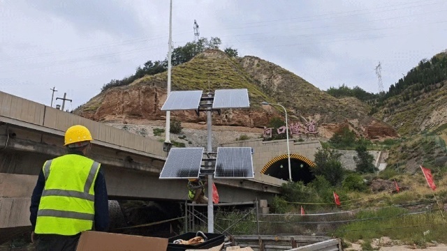 Solar-powered water-management monitoring system installed along a river site in Lanzhou, Gansu, providing stable off-grid operation and environmental protection by Shenzhen Kongfar Technology
