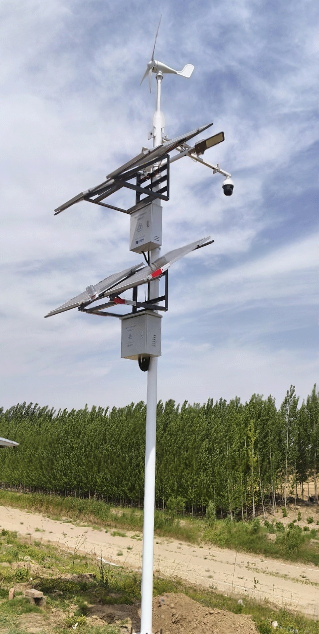 Off-grid hybrid solar-wind energy system supporting long-range hydrology monitoring and sand-mining prevention near Jiaozuo riverbanks. The 400Ah LiFePO₄ reserve ensures continuous operation during haze, rain, or calm-wind days, enabling reliable river-governance data collection and night-time CCTV surveillance without grid infrastructure