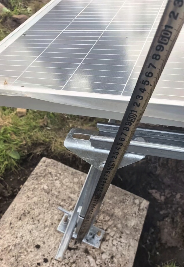 solar power system mounting structure for forest fire monitoring showing galvanized bracket, bolts, and installation height measurement used in cold-climate deployments in Yichun Heilongjiang