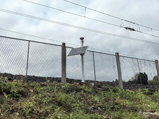 The internal structure of an IP66 outdoor solar power cabin used for GNSS monitoring, showing a LiFePO4 battery pack, MPPT controller, protected wiring, and sealed connectors designed for cold, dusty, and high-altitude environments
