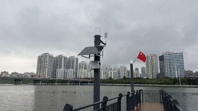 Off-grid solar power system installed at a waterside park communication base station in Anhui, integrated into public infrastructure under high humidity and flood-prone conditions