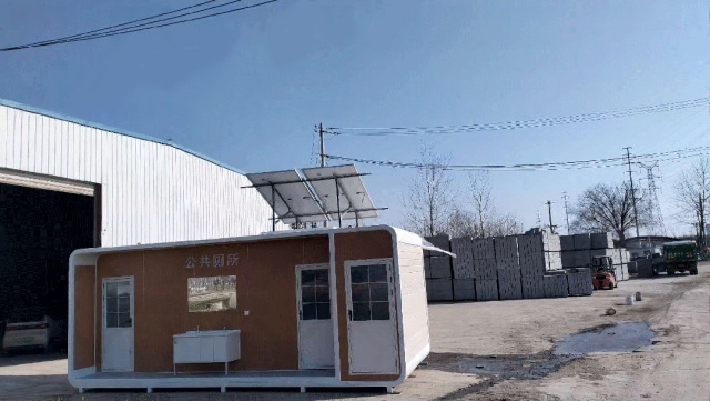 Multiple mobile sanitation units powered by distributed off-grid solar power systems, enabling continuous public utility operation across dispersed outdoor locations in Anhui, China