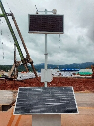 front-view solar dust monitoring station in Xishuangbanna Yunnan China demonstrates that storage-first solar architecture maintains continuous dust warning data transmission under tropical rainfall exposure, high-humidity conditions, field dust accumulation, and grid-deficient outdoor monitoring constraints