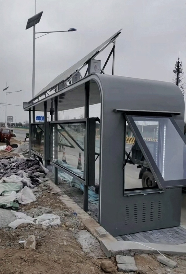 solar-powered bus shelter lightbox and public seating infrastructure in Xi'an Shanxi China confirms that storage-first solar architecture maintains continuous urban public-service operation under grid interruption, haze exposure, dust accumulation, and rainwater-risk roadside conditions